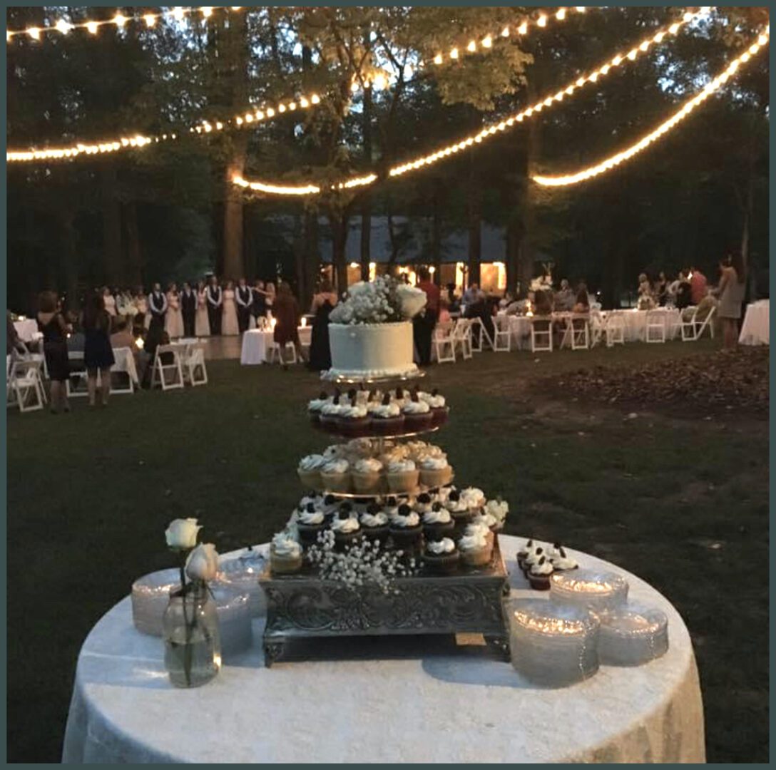 A table with a cake and candles on it